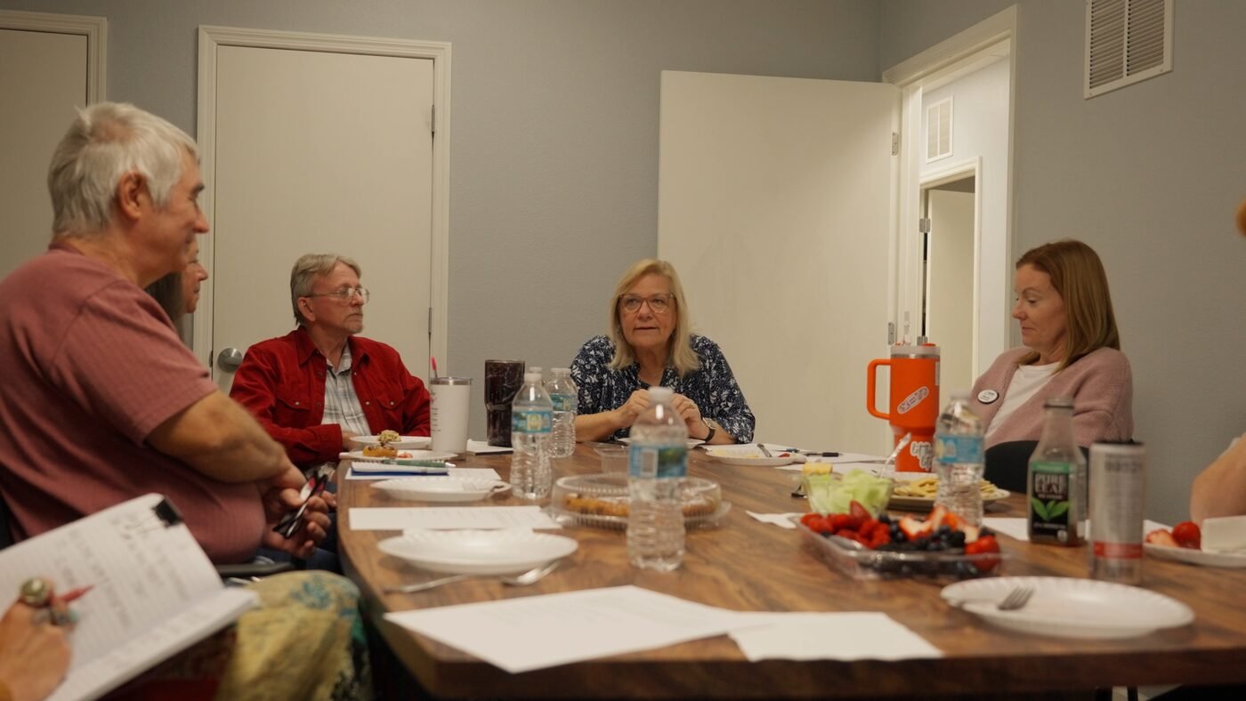 Event photography — group gathered at business meeting